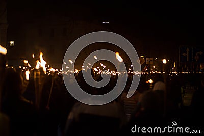 Latvian LacplÄ“sa day 11.november torchlight procession. Torches lit, people go for a walk Stock Photo